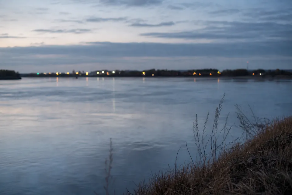 A calm river at blue hour